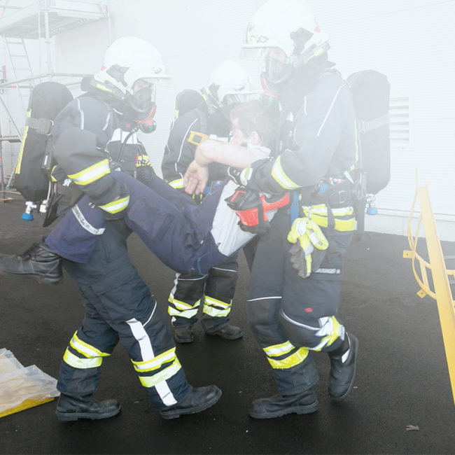 Firefighters with an injured person